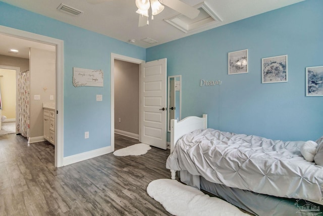 bedroom with ceiling fan and dark hardwood / wood-style floors