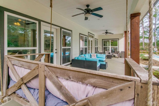 exterior space with an outdoor hangout area and ceiling fan