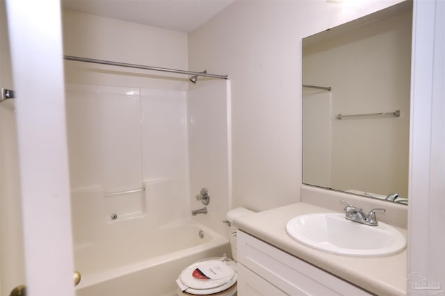 bathroom featuring shower / tub combination, toilet, and vanity