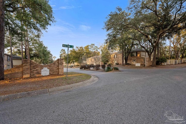 view of road with curbs