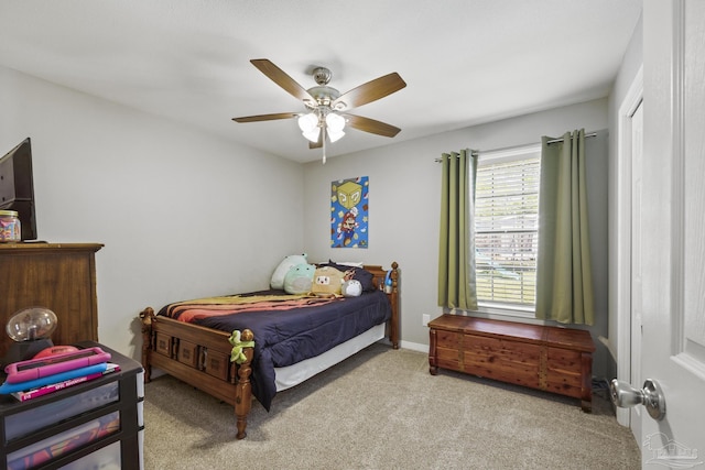 carpeted bedroom featuring a ceiling fan