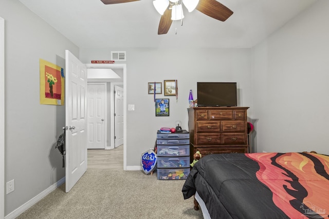 bedroom featuring visible vents, carpet flooring, baseboards, and ceiling fan