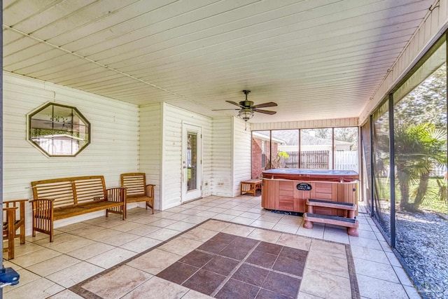 sunroom with ceiling fan