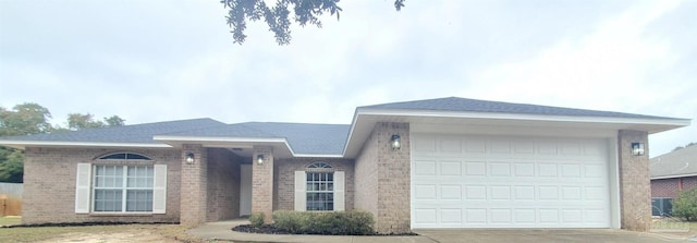 single story home with a garage