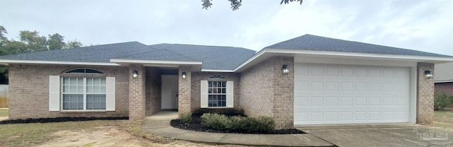 ranch-style house featuring a garage