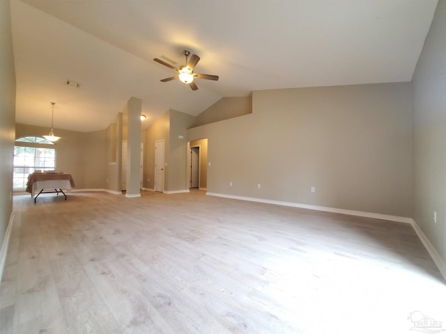 unfurnished room with light hardwood / wood-style flooring, vaulted ceiling, and ceiling fan