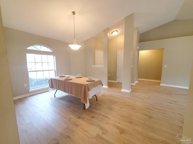 game room with vaulted ceiling and light hardwood / wood-style flooring