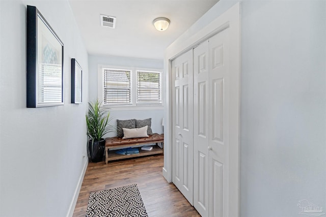 hallway featuring light wood-type flooring