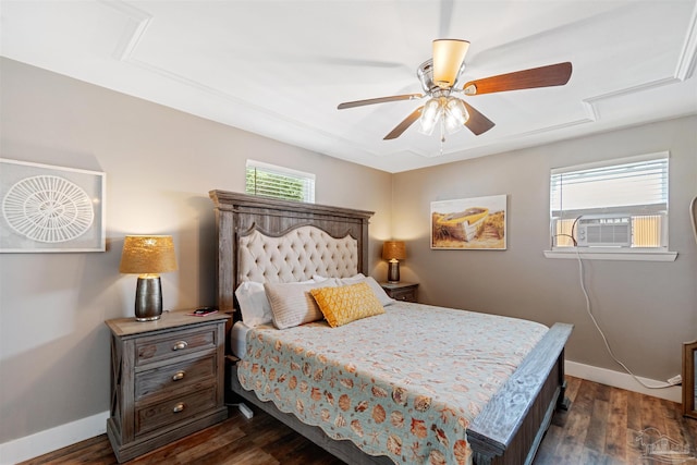 bedroom featuring ceiling fan, cooling unit, dark wood finished floors, and baseboards