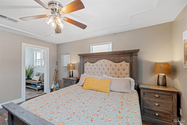 bedroom with ceiling fan and dark wood-type flooring