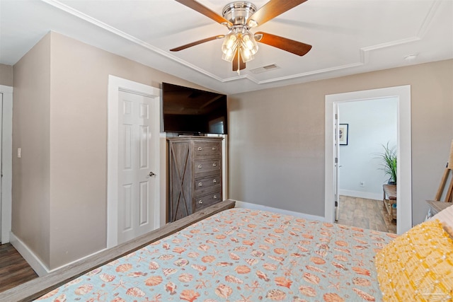 bedroom featuring ceiling fan and wood-type flooring