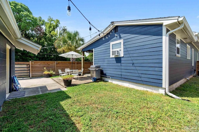 view of yard featuring a patio and fence