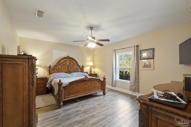 bedroom featuring ceiling fan and light wood-type flooring