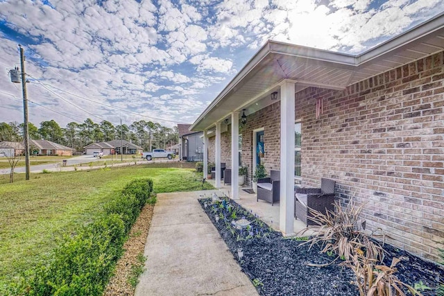 exterior space with a yard and a patio