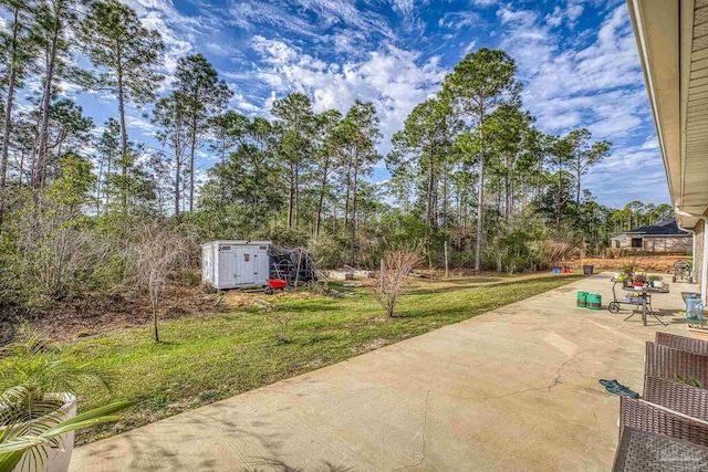 view of patio / terrace with a storage unit