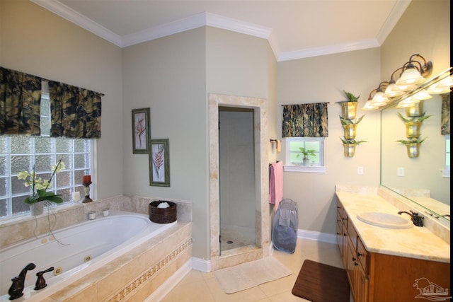 bathroom featuring a whirlpool tub, ornamental molding, tile patterned flooring, and vanity