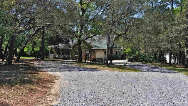 view of front of home featuring a garage and driveway