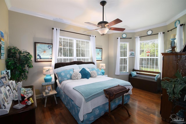 bedroom with a ceiling fan, ornamental molding, and wood finished floors