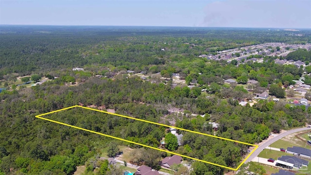 bird's eye view with a view of trees