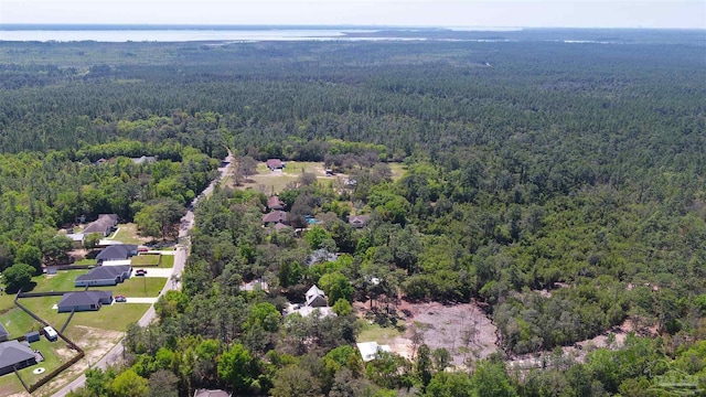 aerial view featuring a view of trees