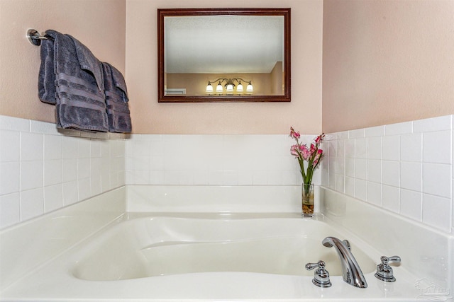 bathroom featuring a tub to relax in