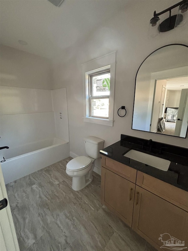 full bathroom with vanity and toilet