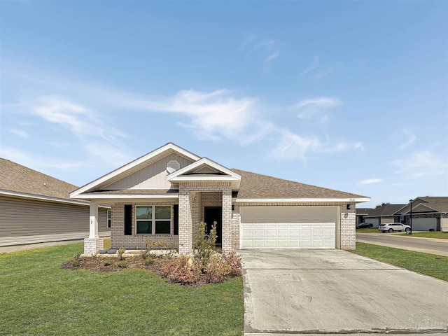 view of front of house with driveway, a shingled roof, a front lawn, a garage, and brick siding