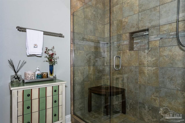 bathroom featuring an enclosed shower