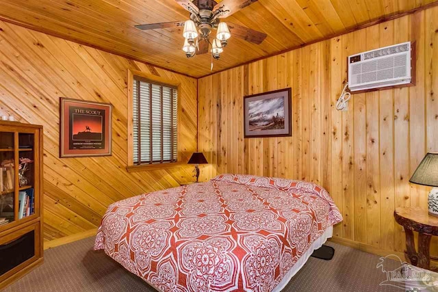 bedroom with ceiling fan, carpet floors, wood ceiling, and a wall mounted air conditioner