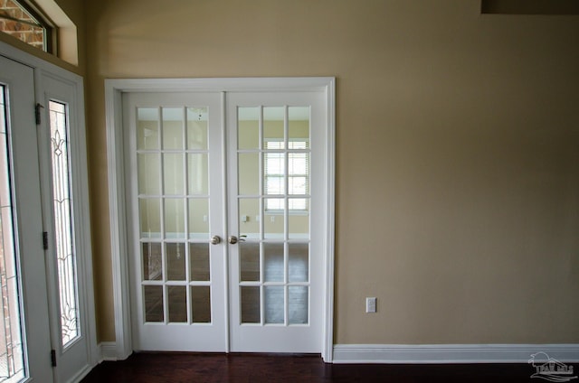4777 Belvedere Cir, Pace, FL 32571 - foyer featuring french doors, baseboards, and dark wood finished floors