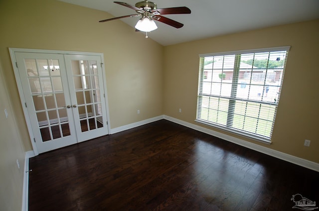 4777 Belvedere Cir, Pace, FL 32571 - empty room featuring vaulted ceiling, baseboards, dark wood finished floors, french doors, and a ceiling fan