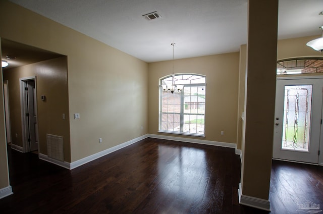 4777 Belvedere Cir, Pace, FL 32571 - entryway with a chandelier, wood finished floors, and baseboards