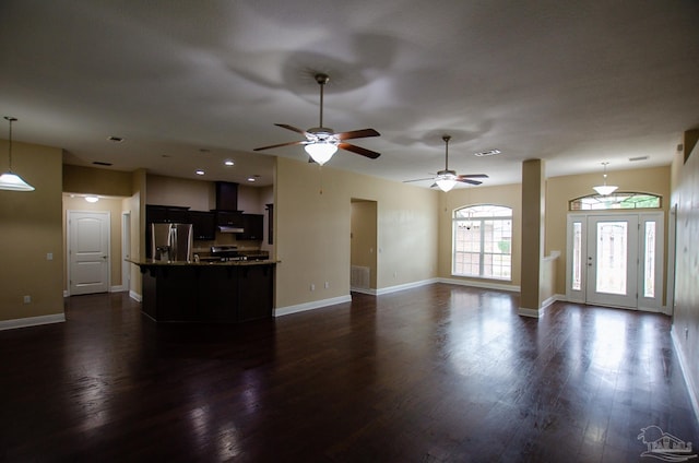 4777 Belvedere Cir, Pace, FL 32571 - unfurnished living room with dark wood finished floors, ceiling fan, baseboards, and recessed lighting