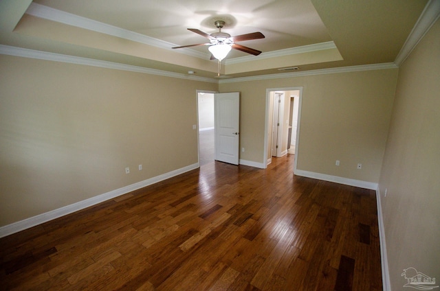 4777 Belvedere Cir, Pace, FL 32571 - unfurnished room with a tray ceiling, ceiling fan, dark wood finished floors, baseboards, and crown molding