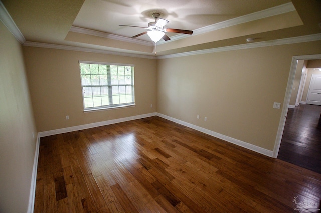 4777 Belvedere Cir, Pace, FL 32571 - unfurnished room featuring a tray ceiling, a ceiling fan, dark wood-style floors, crown molding, and baseboards