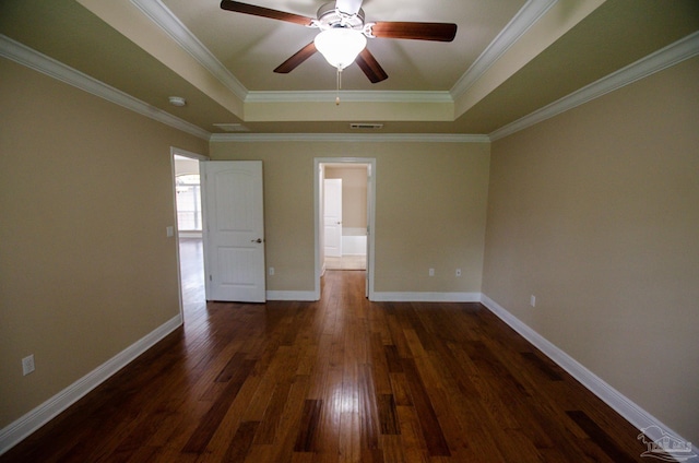 4777 Belvedere Cir, Pace, FL 32571 - unfurnished room with a tray ceiling, dark wood-style flooring, ceiling fan, ornamental molding, and baseboards
