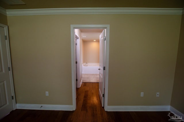 4777 Belvedere Cir, Pace, FL 32571 - hallway with baseboards and wood finished floors