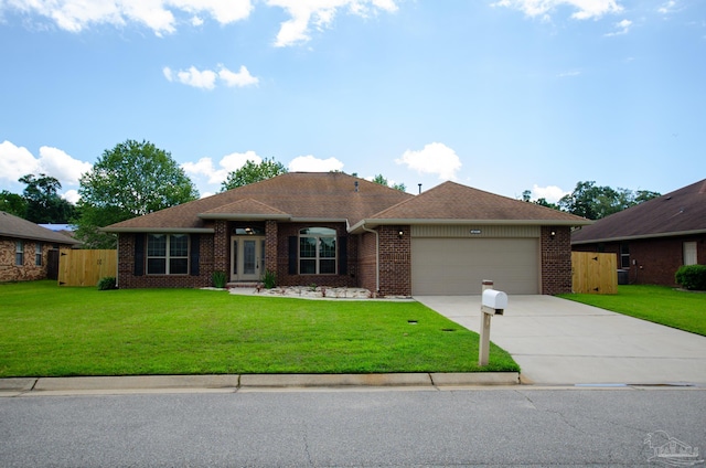 4777 Belvedere Cir, Pace, FL 32571 - single story home with brick siding, an attached garage, driveway, and roof with shingles