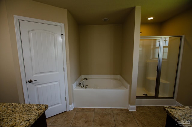 4777 Belvedere Cir, Pace, FL 32571 - full bath featuring vanity, tile patterned floors, a stall shower, a garden tub, and recessed lighting