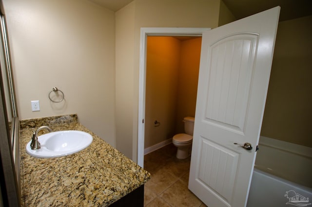 4777 Belvedere Cir, Pace, FL 32571 - full bathroom with vanity, toilet, tile patterned flooring, and a tub