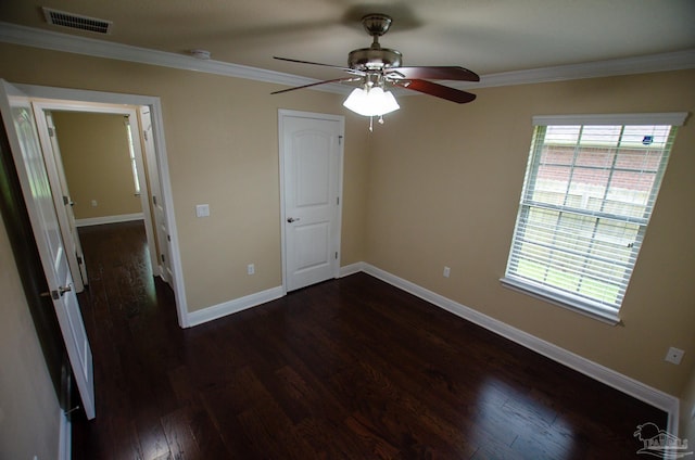 4777 Belvedere Cir, Pace, FL 32571 - unfurnished bedroom with dark wood-style flooring, crown molding, baseboards, and a ceiling fan