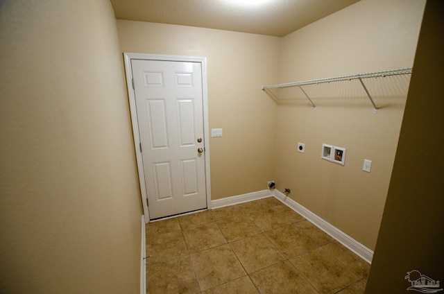 4777 Belvedere Cir, Pace, FL 32571 - washroom with hookup for an electric dryer, washer hookup, hookup for a gas dryer, light tile patterned floors, and baseboards