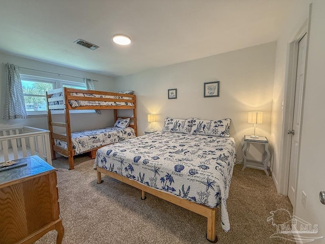 1448 Tina Dr Unit 213, Navarre Beach, FL 32566 - bedroom with carpet flooring