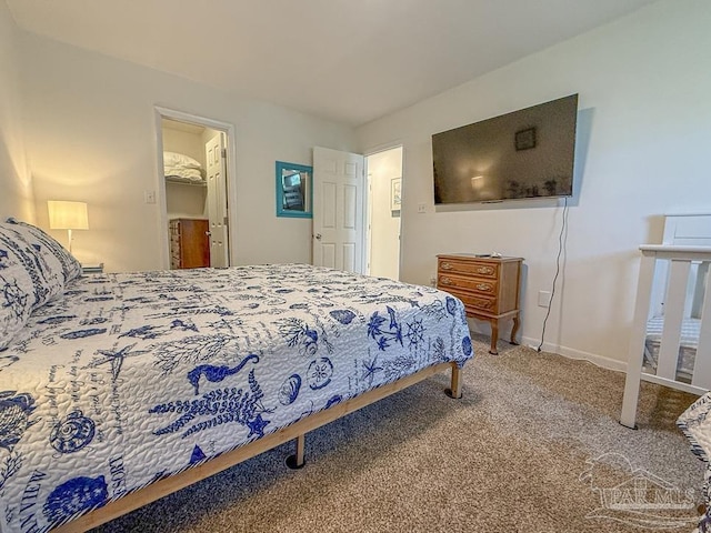 1448 Tina Dr Unit 213, Navarre Beach, FL 32566 - bedroom featuring carpet floors and baseboards