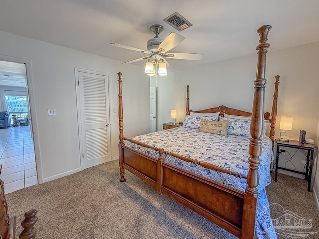 1448 Tina Dr Unit 213, Navarre Beach, FL 32566 - bedroom featuring carpet flooring, a ceiling fan, and baseboards