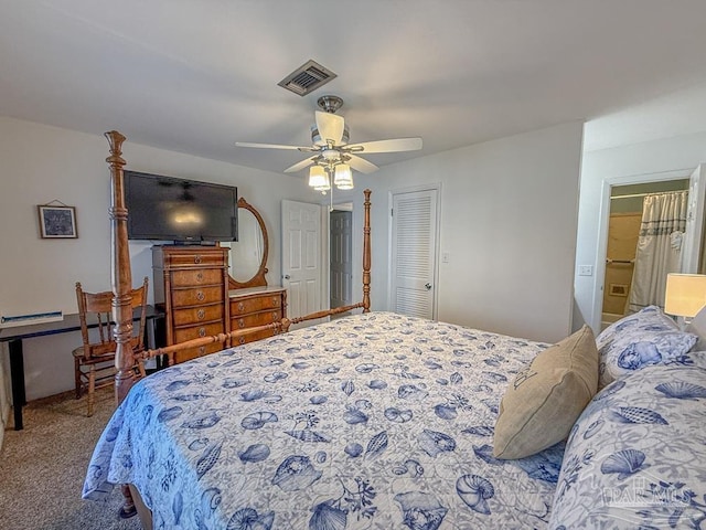 1448 Tina Dr Unit 213, Navarre Beach, FL 32566 - carpeted bedroom with ceiling fan, a closet, and connected bathroom