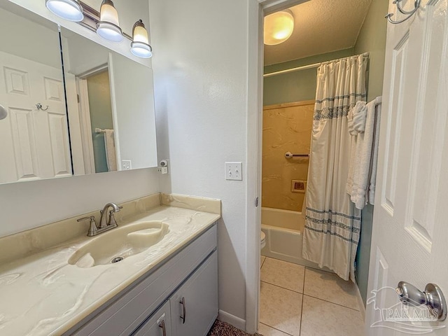 1448 Tina Dr Unit 213, Navarre Beach, FL 32566 - bathroom featuring vanity, tile patterned flooring, shower / bath combo with shower curtain, and toilet