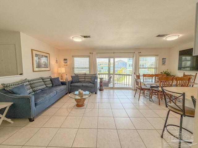 1448 Tina Dr Unit 213, Navarre Beach, FL 32566 - living area with light tile patterned floors