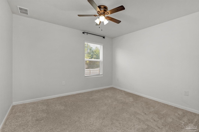 5457 Merlin Way, Milton, FL 32583 - carpeted empty room featuring a ceiling fan and baseboards