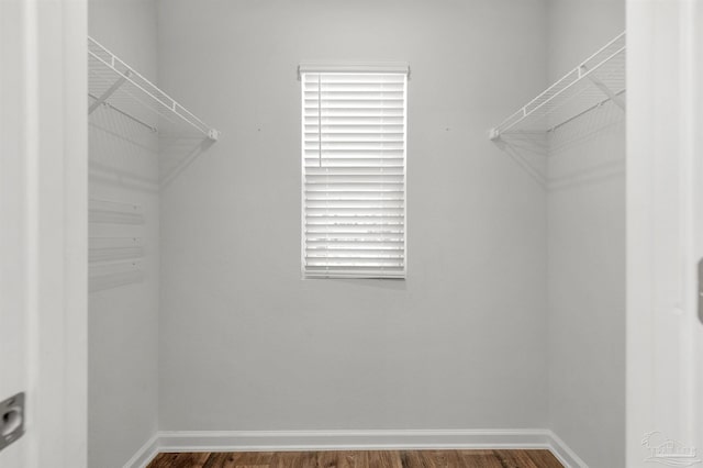 5457 Merlin Way, Milton, FL 32583 - spacious closet featuring wood finished floors